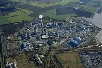 Illustrative industrial cluster imagery — not confirmed to depict the actual Atta-Inyishi-Amaimo site